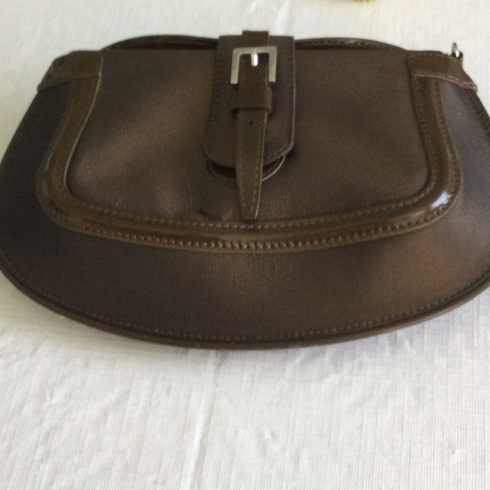 Elegant Brown Clutching Purse with chain close by magnet *